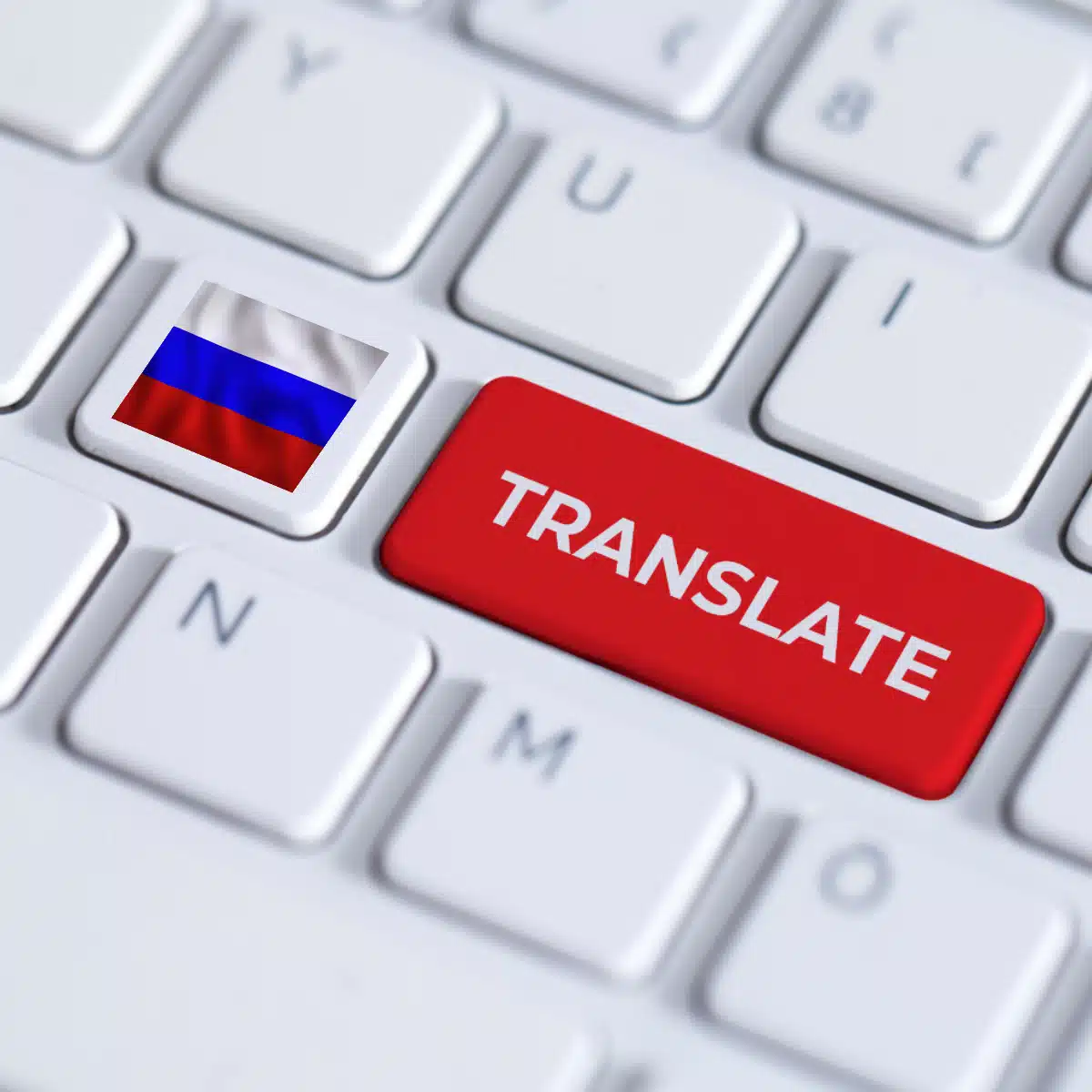 A computer keyboard with a key showing the Russian flag and a large red key labeled "TRANSLATE," symbolizing translation from Russian to another language.